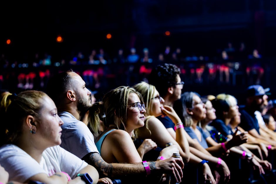 audience watching fashion show intently