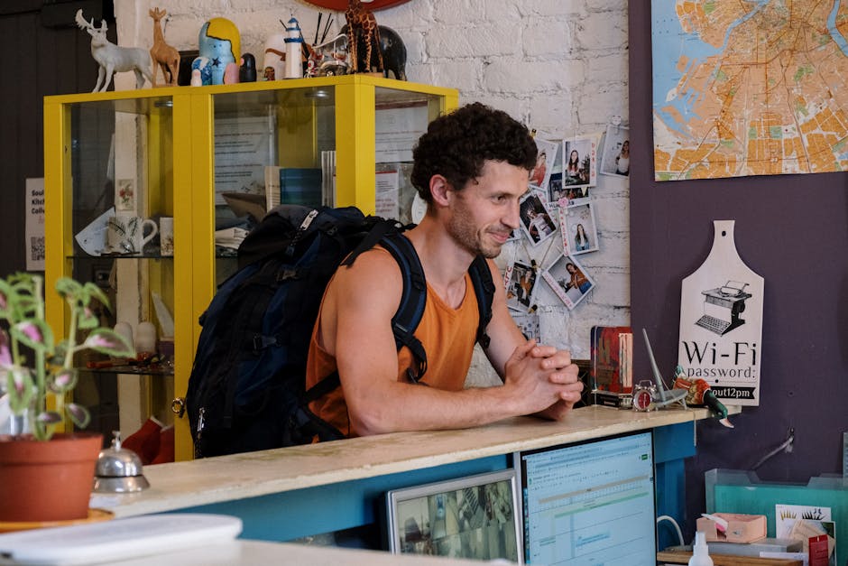 Backpacker checking map old town