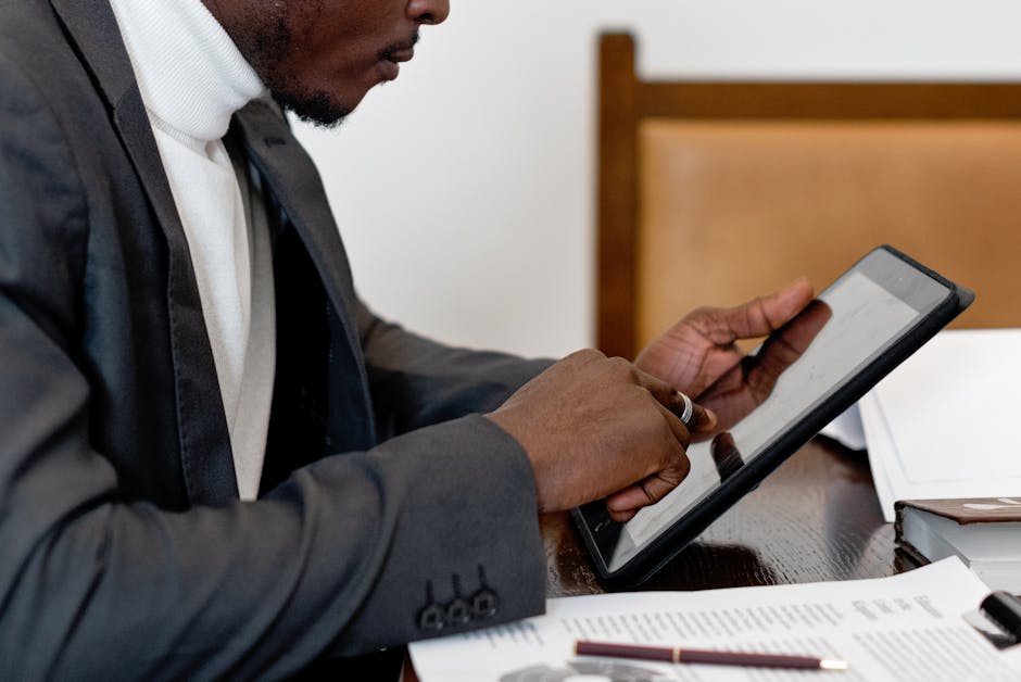 Businessman using AI tools on tablet