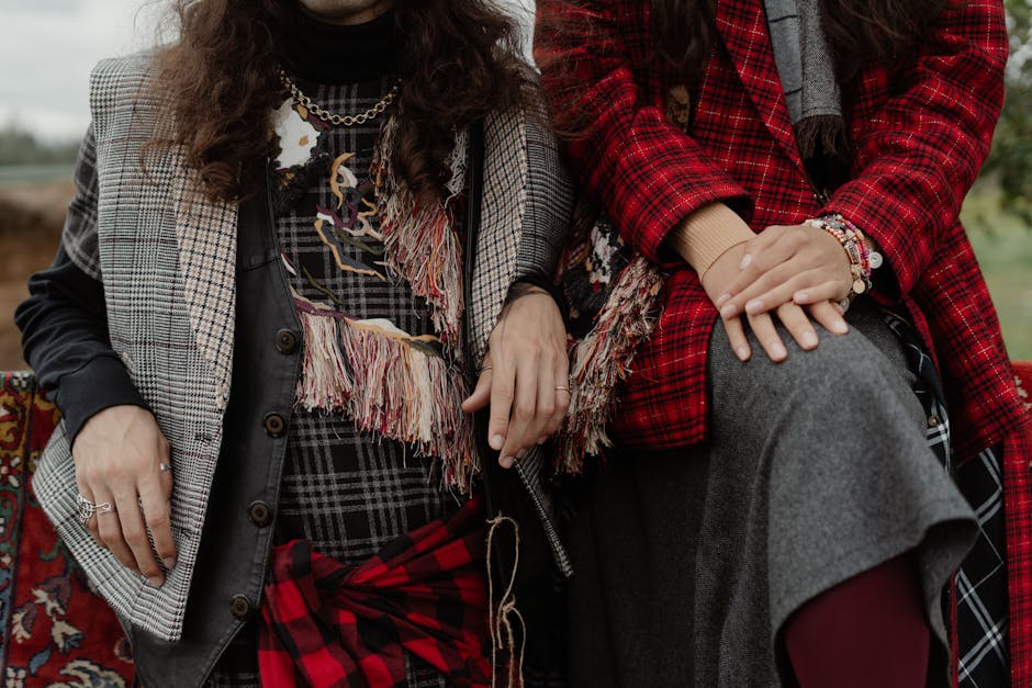 Close up of hands with mixed colorful bracelets and rings