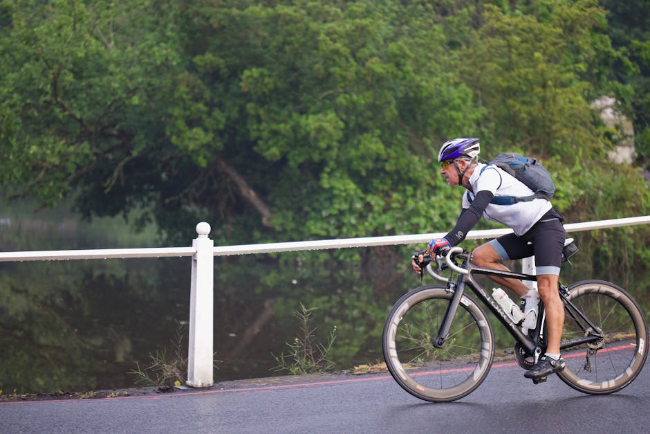 couple cycling along river