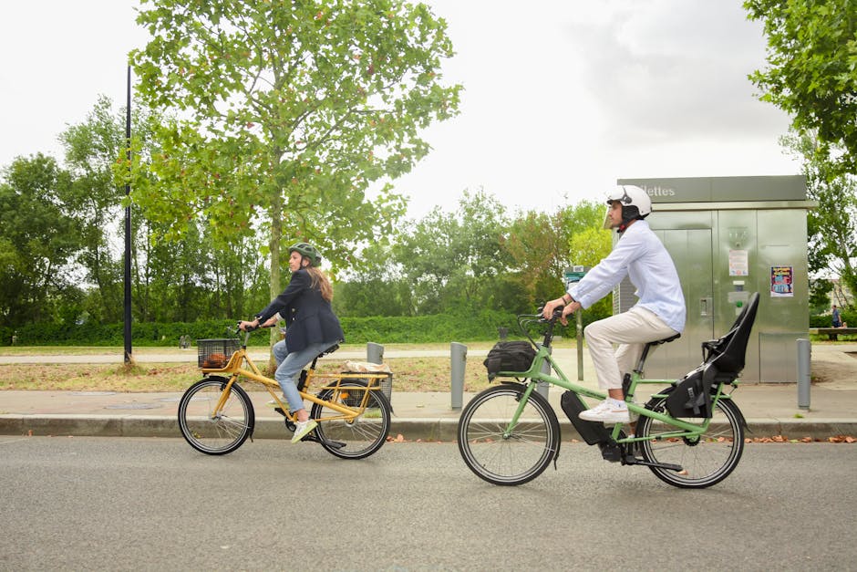 couple on bike ride through vineyards france