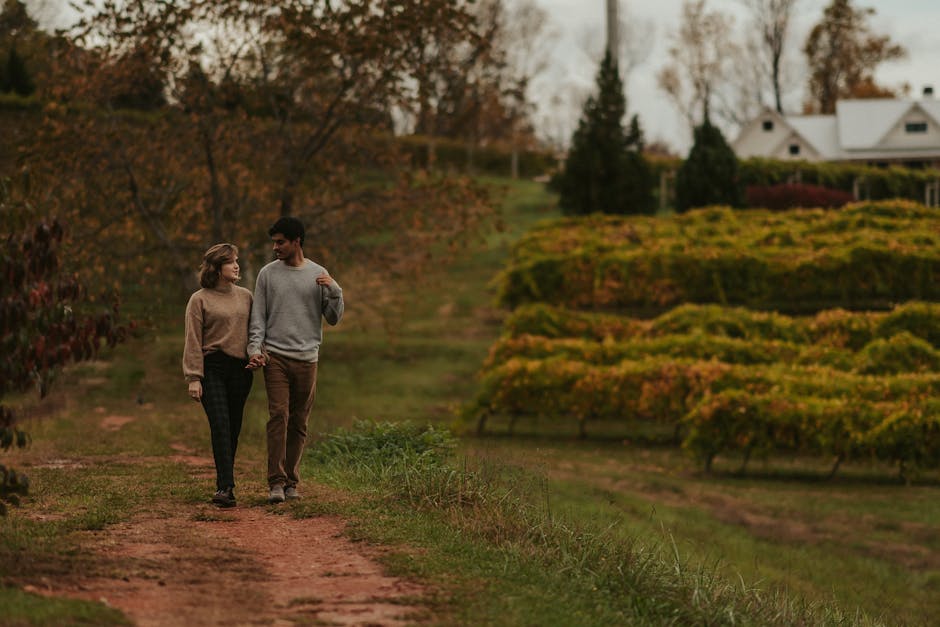 couple walking autumn vineyard