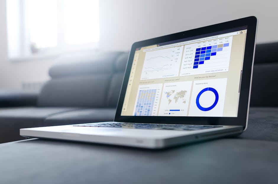 Data analytics dashboard with charts and graphs on screen
