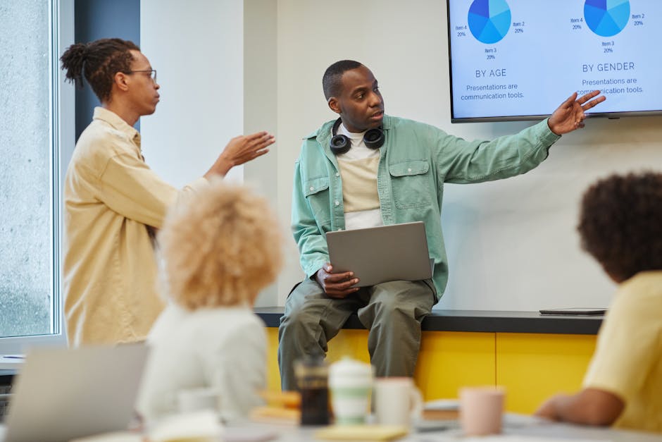 Diverse group of young professionals brainstorming with data visualization