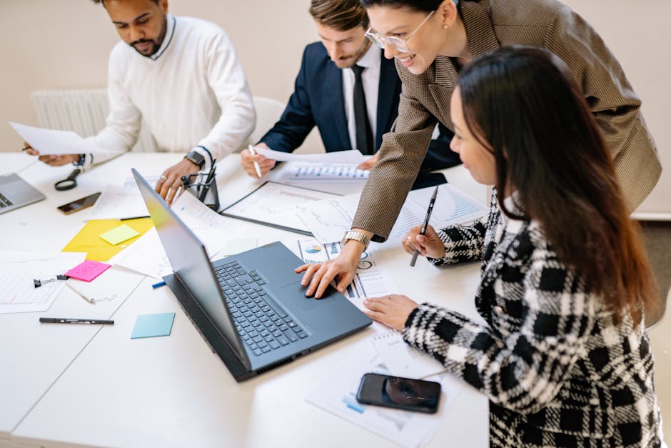 diverse team collaborating with AI dashboard