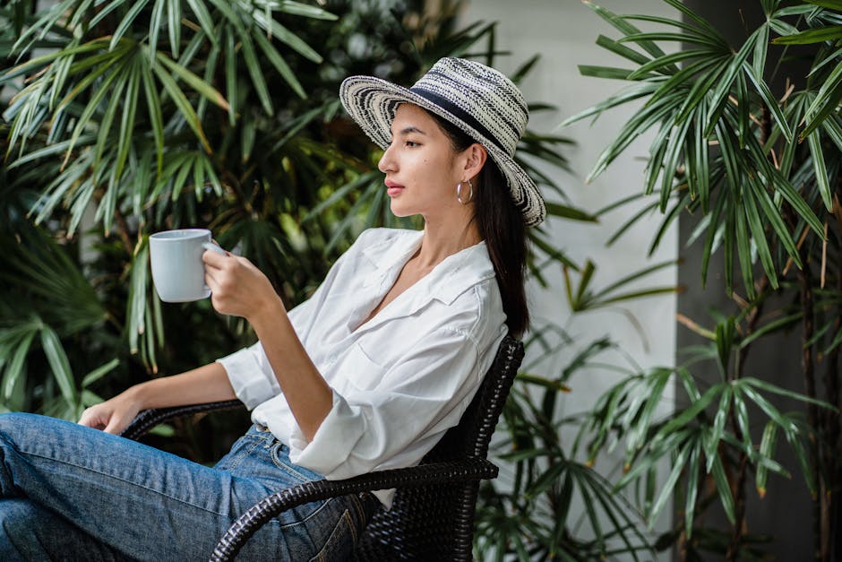 elegant french woman enjoying coffee outdoors