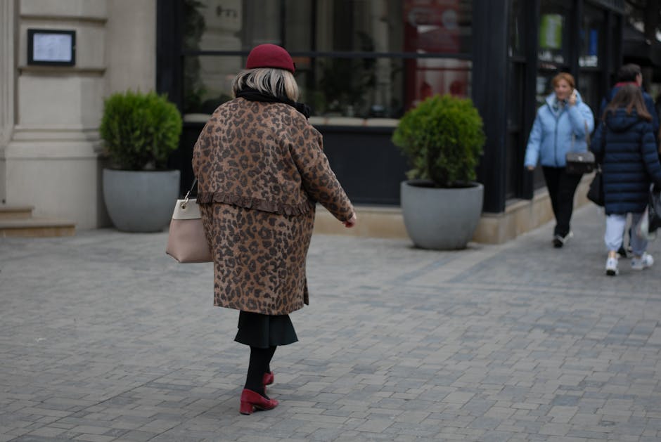 elegant woman walking city street