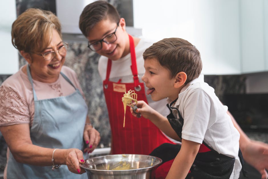 Family cooking together kitchen laughing