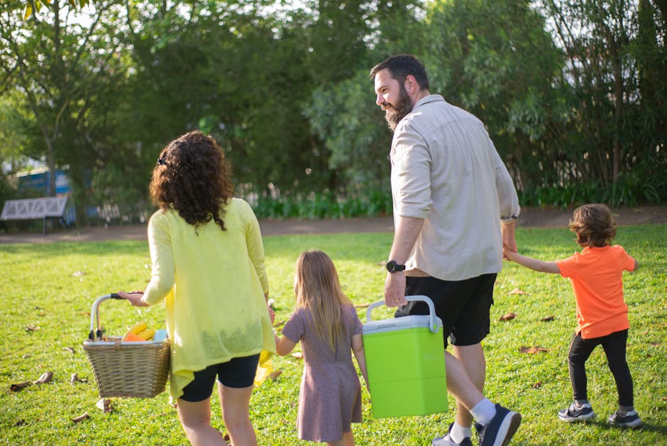 family enjoying simple outdoor picnic