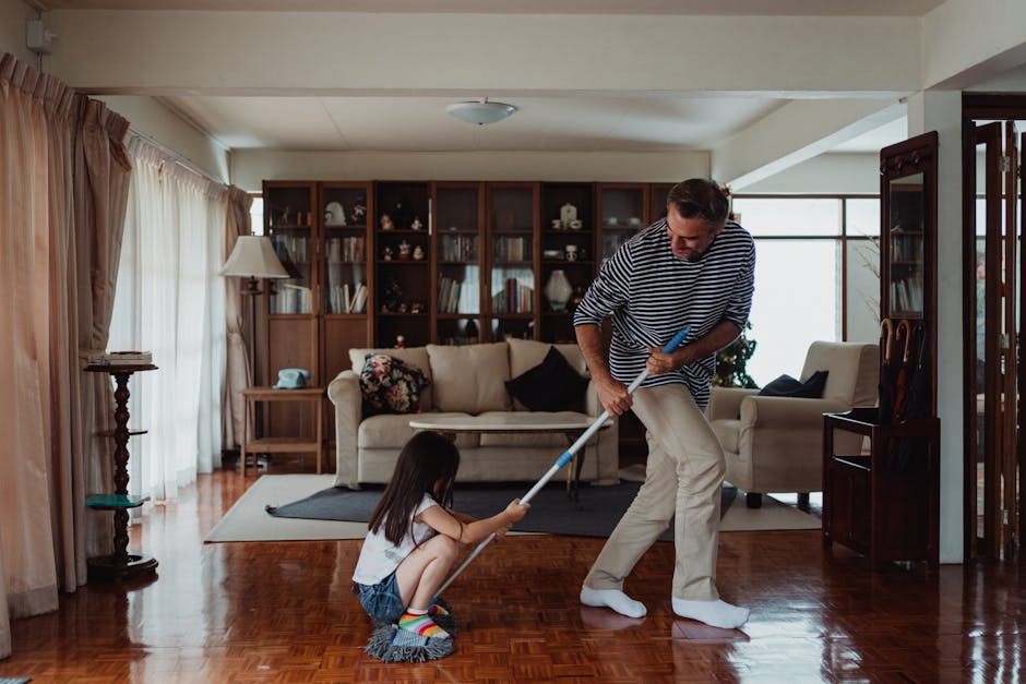 family tidying living room