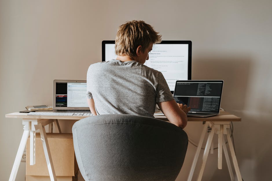 freelancer looking at a computer screen with multiple apps