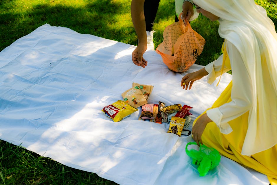 friends enjoying simple picnic in park