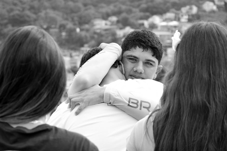Friends hugging outdoors Brazil