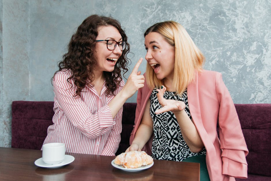 friends laughing coffee shop