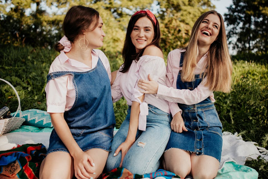 friends laughing enjoying outdoor picnic