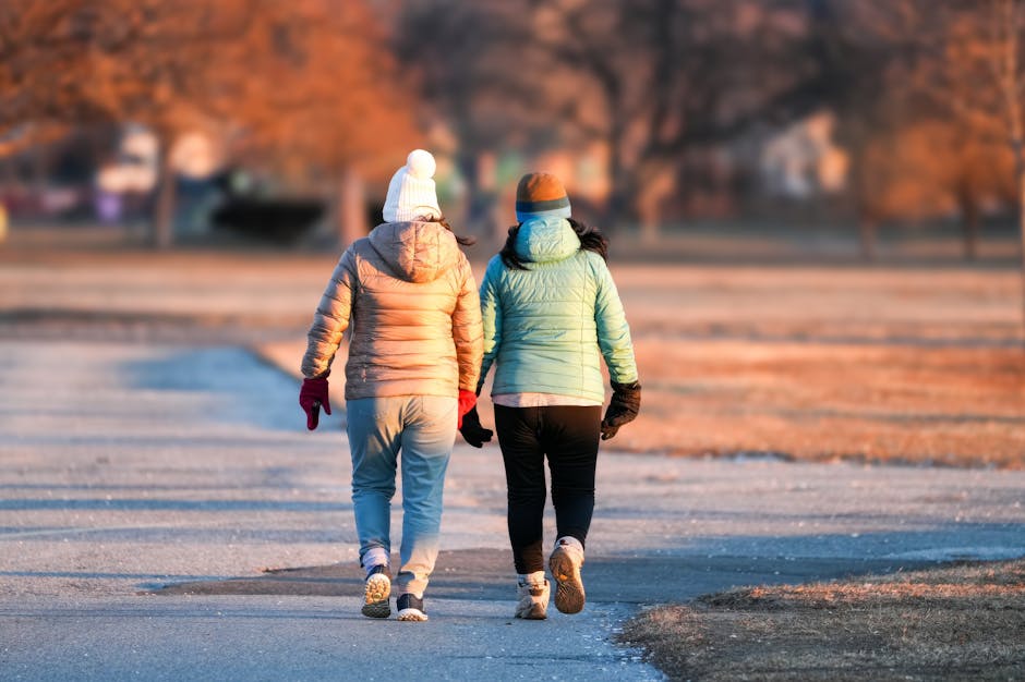 friends walking in a park winter