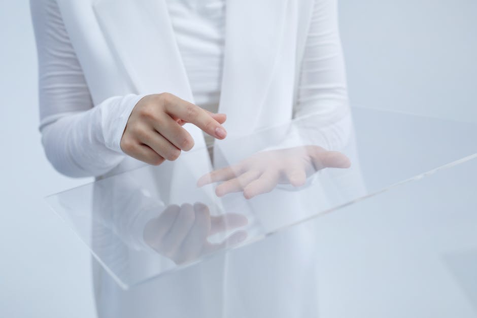 Hands interacting with holographic AI interface