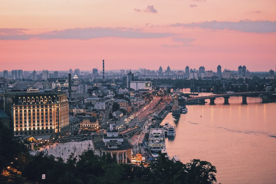 Kyiv cityscape sunset Dnipro river