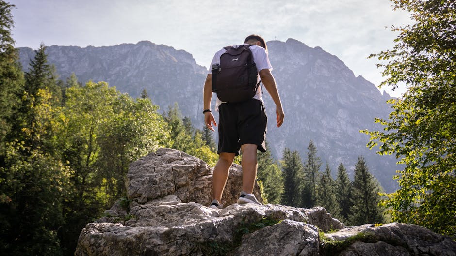 Man hiking in Polish mountains looking at view