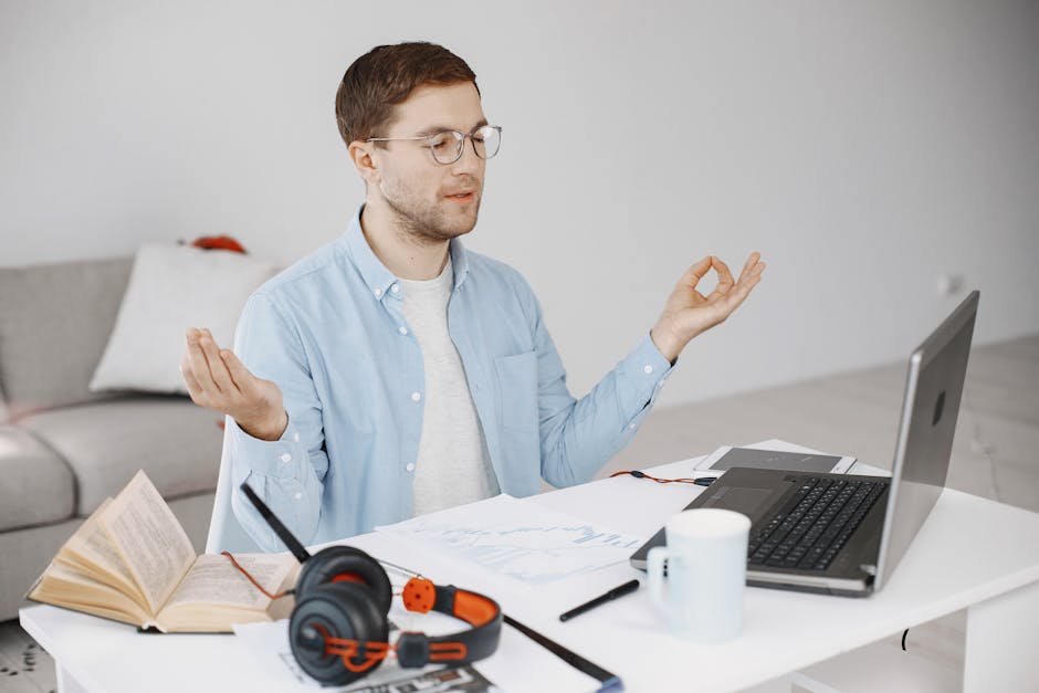man meditating briefly office