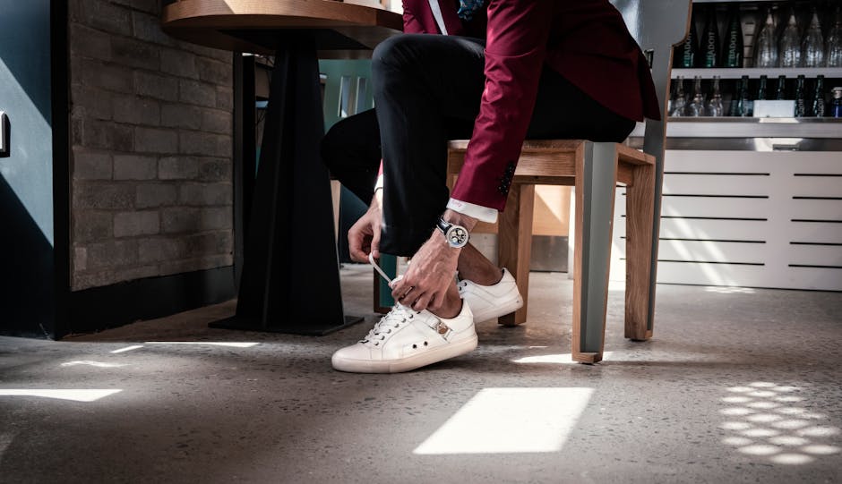 Man mixing classic blazer with sneakers
