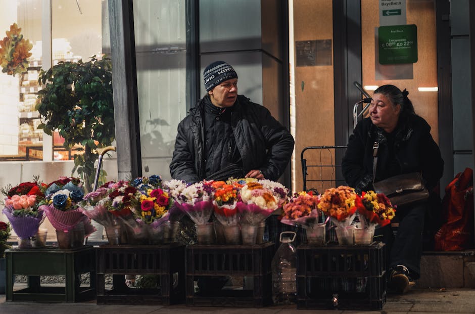 old polish woman selling flowers market