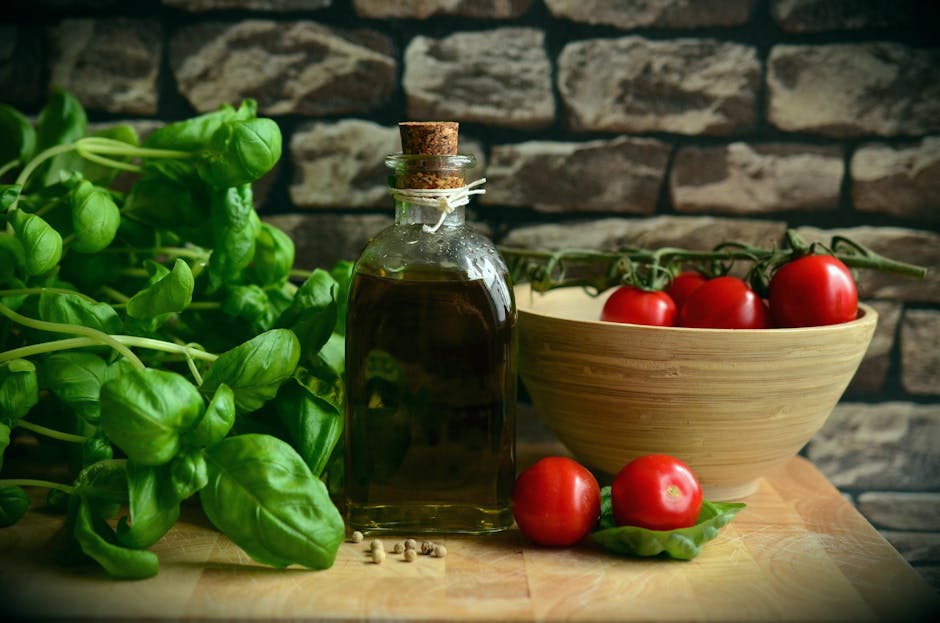 olive oil bottle and fresh vegetables