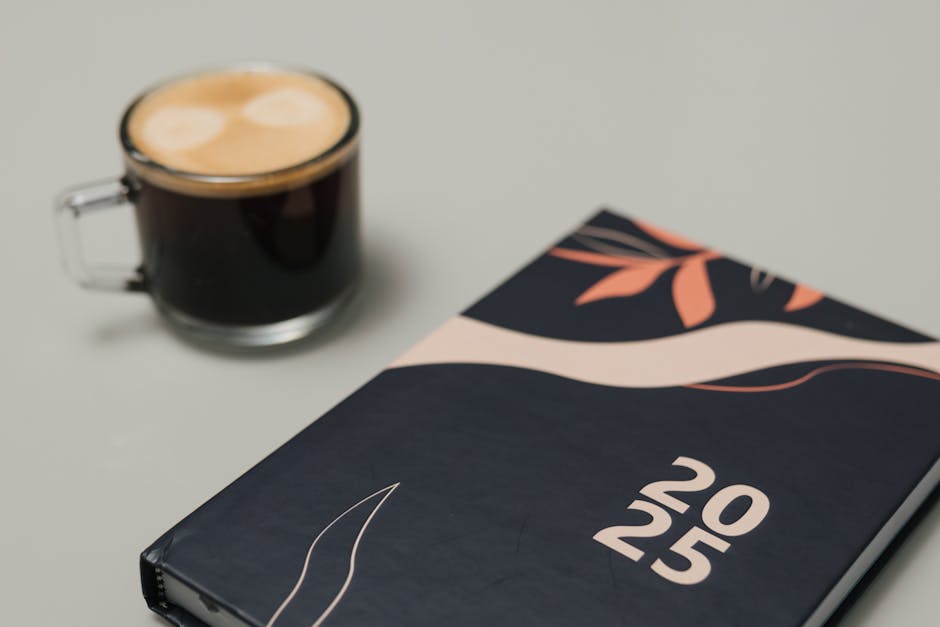 organized person's morning routine with coffee and planner