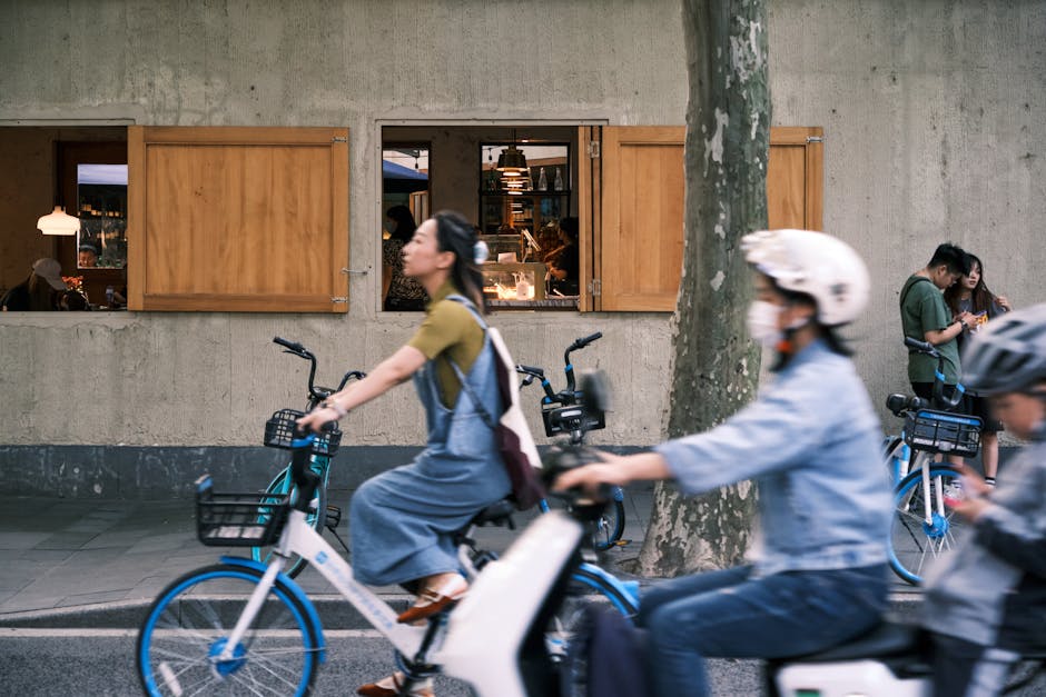 People cycling green city