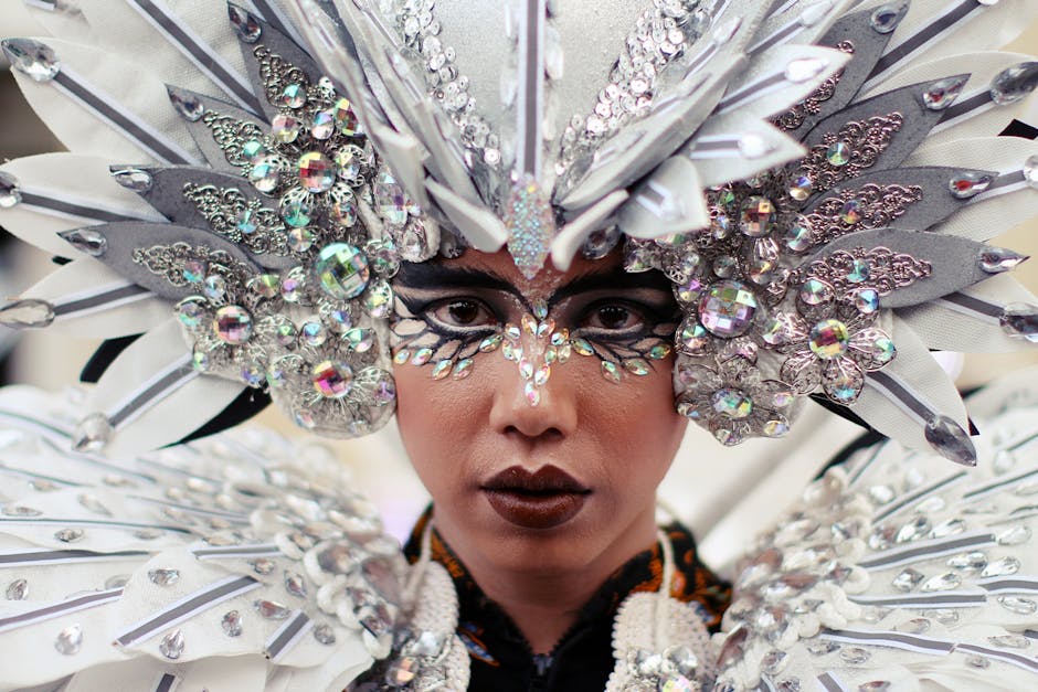 People in elaborate festival wear, close-up
