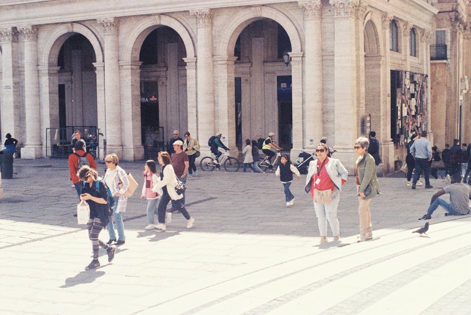 People walking in Italian town square
