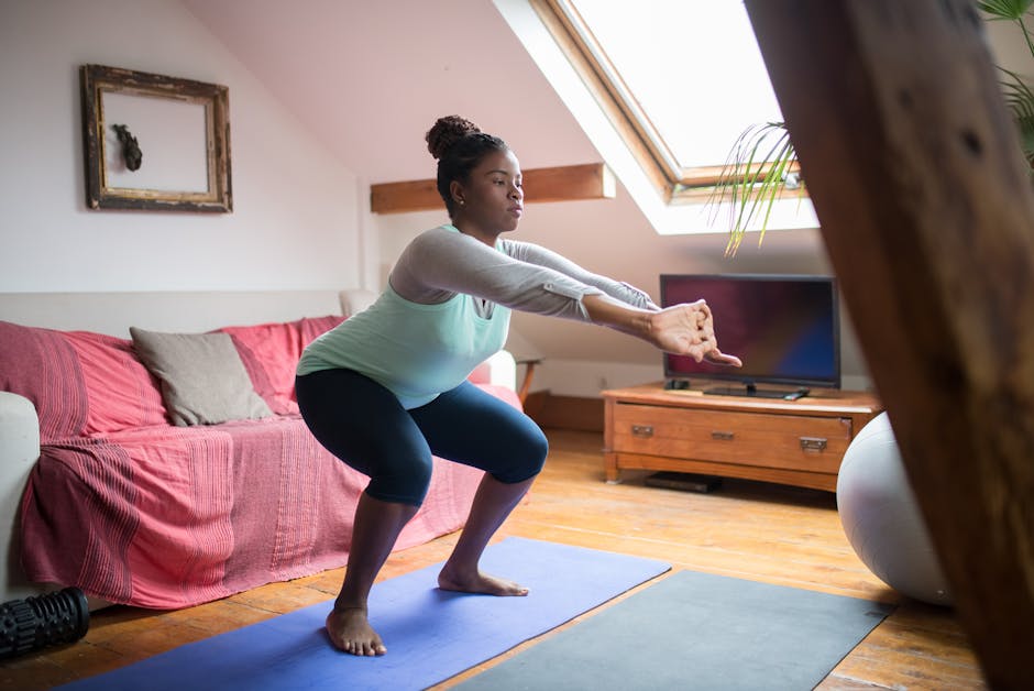 person doing bodyweight squats living room