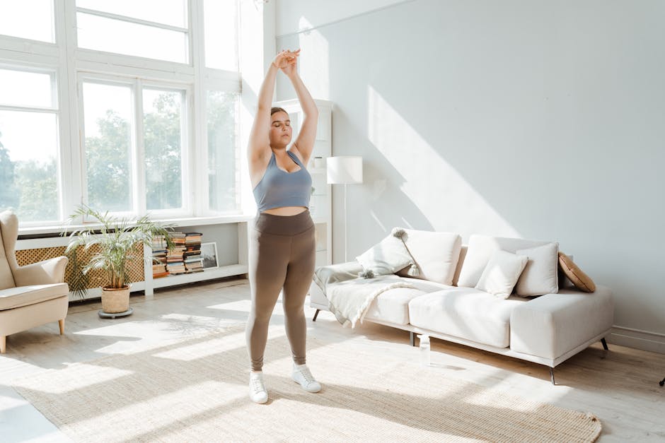 person doing morning stretches in bright room