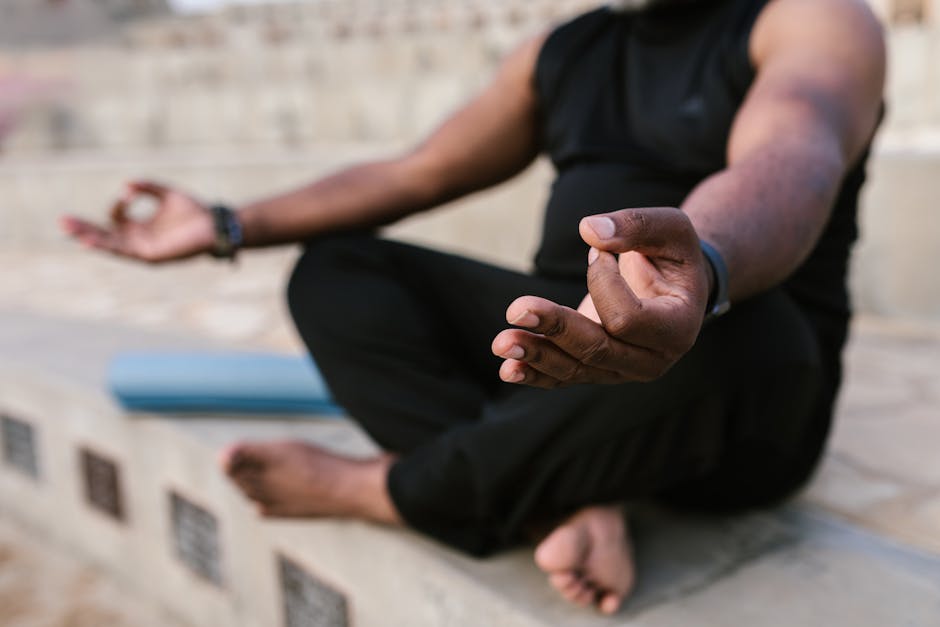 person doing yoga outdoors