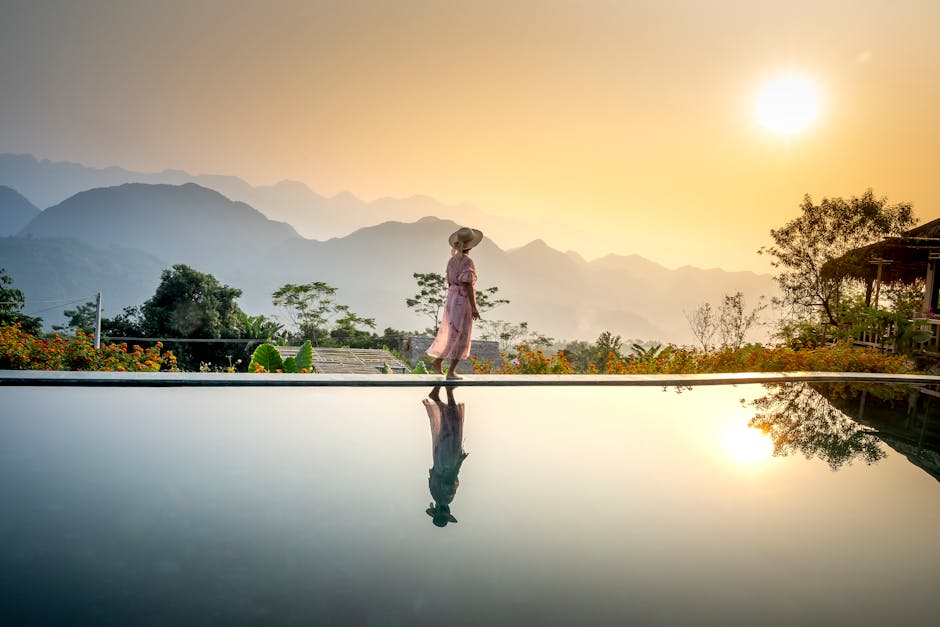 person enjoying sunset tropical landscape