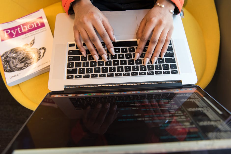 person learning coding at laptop