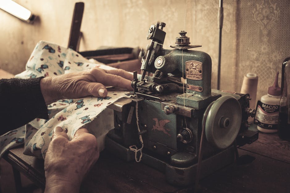 person mending clothes