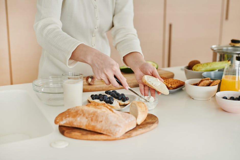 Person preparing a colorful, balanced meal in a bright kitchen