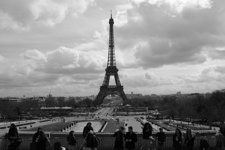 police presence at eiffel tower with tourists