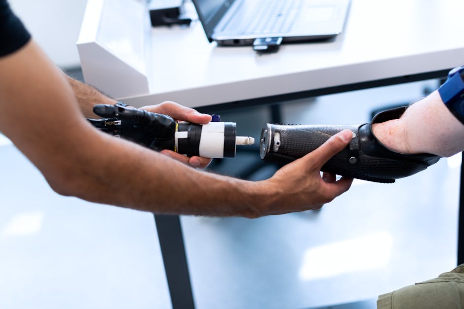 robot hand helping business person