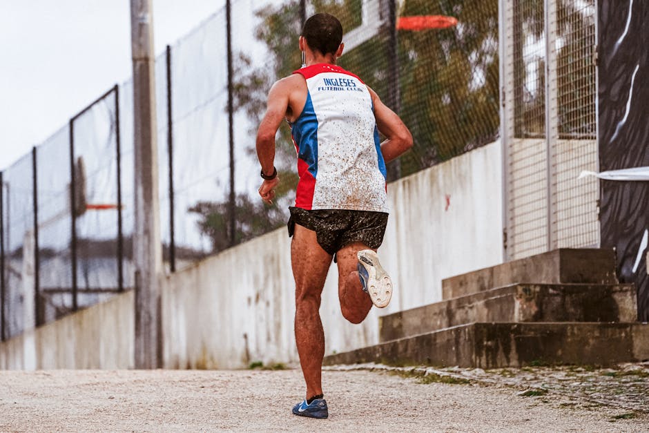 runner overcoming obstacles stormy weather