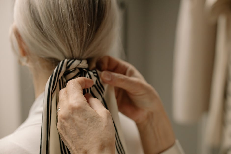 Russian woman tying silk scarf