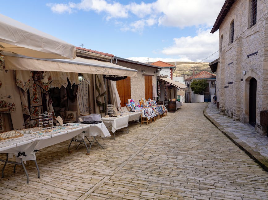 Scenic French village street with market stalls