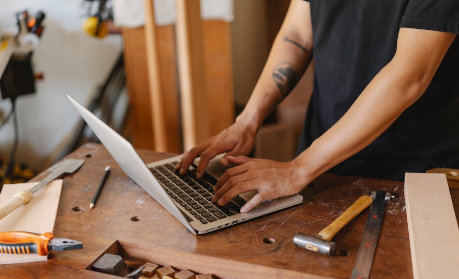 Small business owner using AI marketing tools on laptop