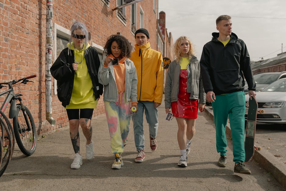 Stylish diverse people walking city street