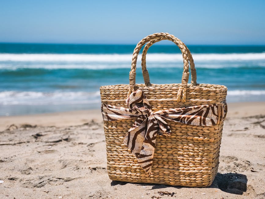 Stylish straw bag with tropical print and vibrant accessories