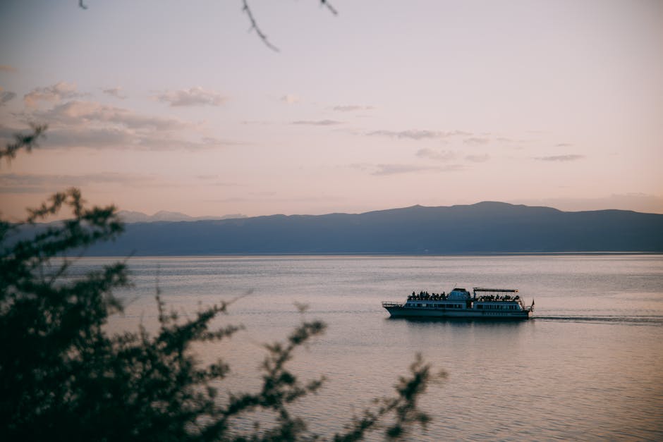 Summer sunset over Lake Baikal with boat