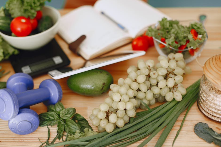 table with healthy food options and notebook