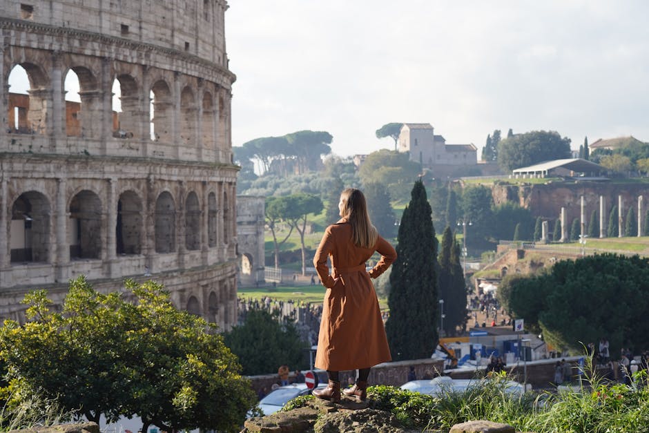 Tourist looking at Rome Colosseum
